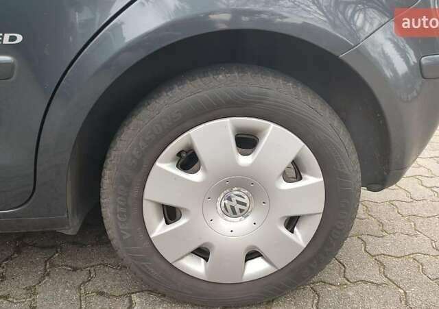 Серый Фольксваген Поло, объемом двигателя 1.2 л и пробегом 246 тыс. км за 4590 $, фото 7 на Automoto.ua