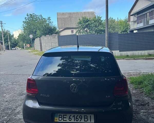 Серый Фольксваген Поло, объемом двигателя 1.4 л и пробегом 210 тыс. км за 7900 $, фото 4 на Automoto.ua