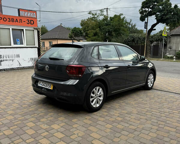 Серый Фольксваген Поло, объемом двигателя 1 л и пробегом 220 тыс. км за 14500 $, фото 4 на Automoto.ua