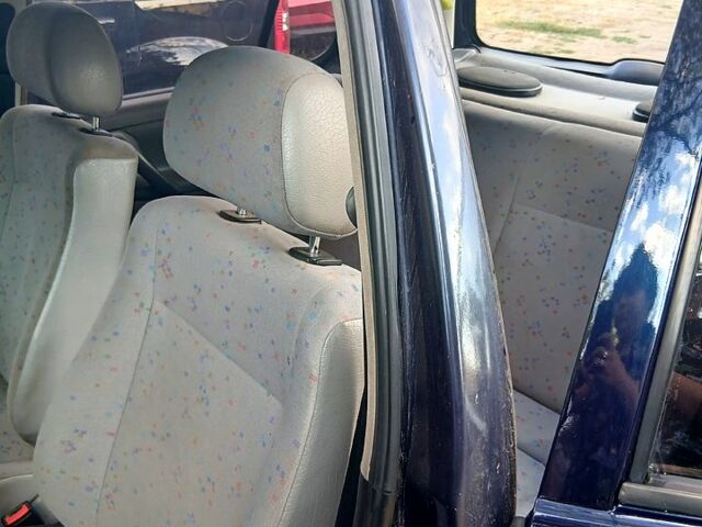 Синий Фольксваген Поло, объемом двигателя 1.3 л и пробегом 75 тыс. км за 1600 $, фото 8 на Automoto.ua