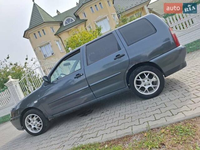 Синий Фольксваген Поло, объемом двигателя 1.4 л и пробегом 249 тыс. км за 2000 $, фото 1 на Automoto.ua