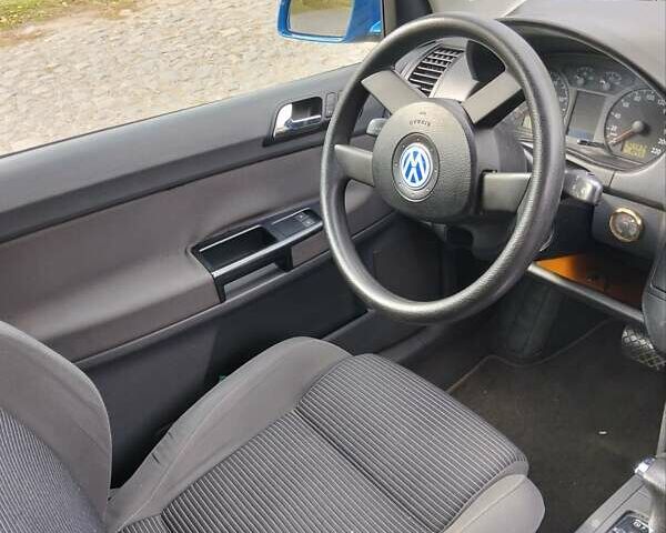 Синій Фольксваген Поло, об'ємом двигуна 1.4 л та пробігом 100 тис. км за 5800 $, фото 4 на Automoto.ua