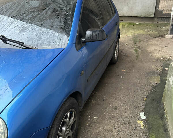 Синий Фольксваген Поло, объемом двигателя 1.4 л и пробегом 225 тыс. км за 3700 $, фото 3 на Automoto.ua