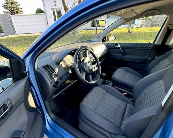 Синий Фольксваген Поло, объемом двигателя 1.2 л и пробегом 265 тыс. км за 3650 $, фото 2 на Automoto.ua