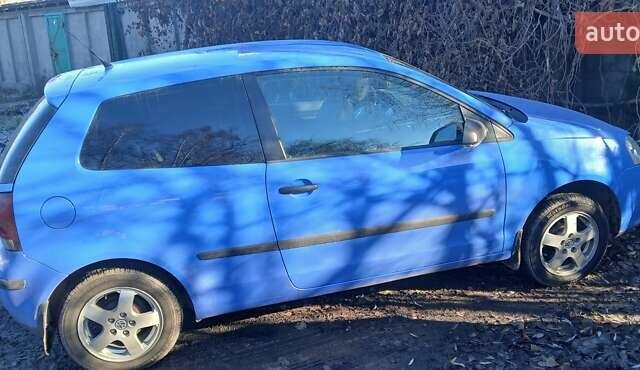 Синий Фольксваген Поло, объемом двигателя 1.39 л и пробегом 267 тыс. км за 4200 $, фото 1 на Automoto.ua