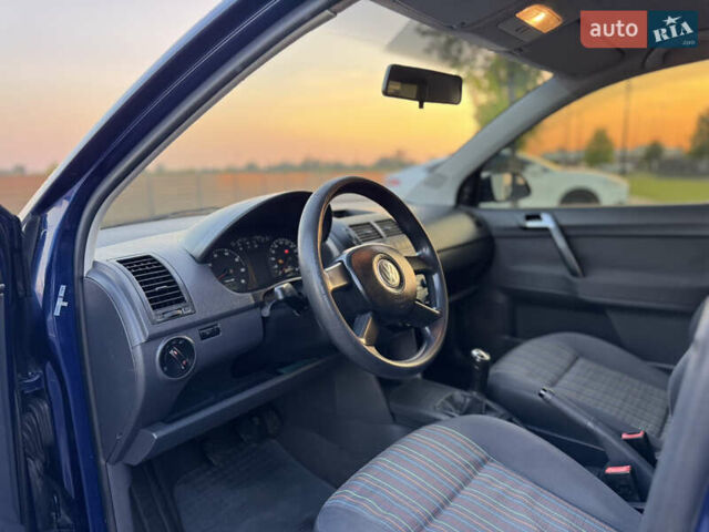 Синій Фольксваген Поло, об'ємом двигуна 1.2 л та пробігом 201 тис. км за 3999 $, фото 44 на Automoto.ua
