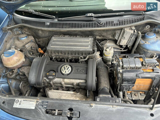 Синий Фольксваген Поло, объемом двигателя 1.39 л и пробегом 211 тыс. км за 4700 $, фото 18 на Automoto.ua