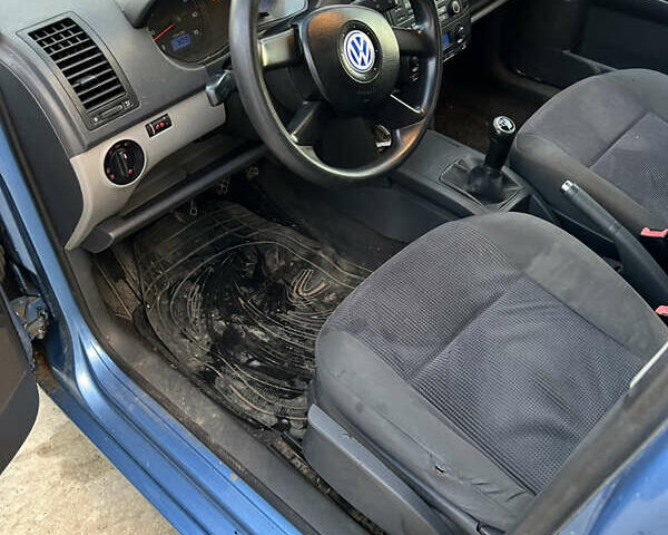 Синий Фольксваген Поло, объемом двигателя 1.2 л и пробегом 225 тыс. км за 2750 $, фото 10 на Automoto.ua