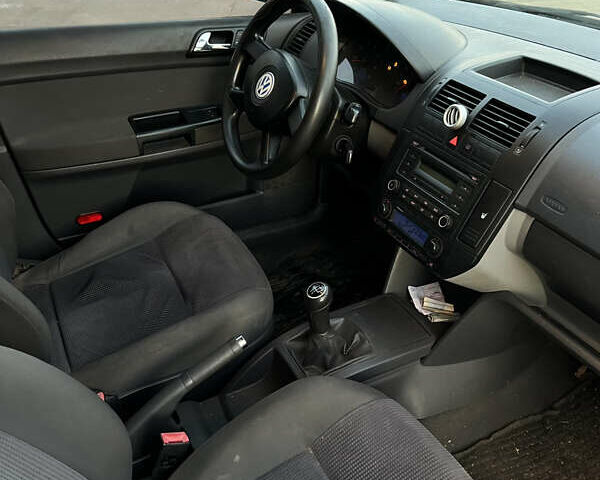 Синий Фольксваген Поло, объемом двигателя 1.2 л и пробегом 225 тыс. км за 2750 $, фото 15 на Automoto.ua