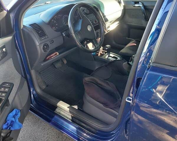 Синий Фольксваген Поло, объемом двигателя 1.4 л и пробегом 214 тыс. км за 4800 $, фото 1 на Automoto.ua