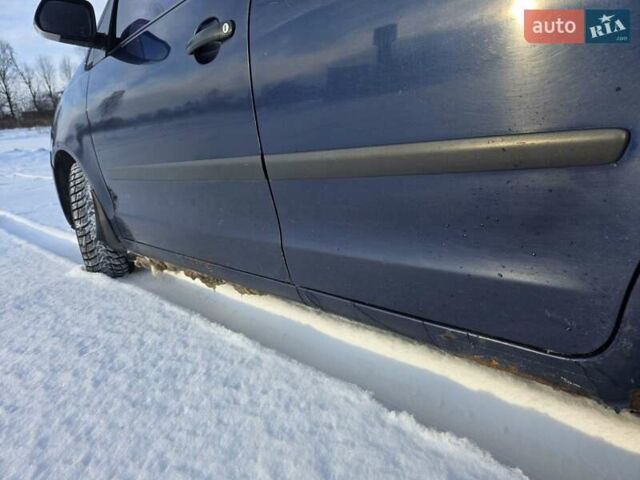 Синій Фольксваген Поло, об'ємом двигуна 1.4 л та пробігом 219 тис. км за 4550 $, фото 18 на Automoto.ua