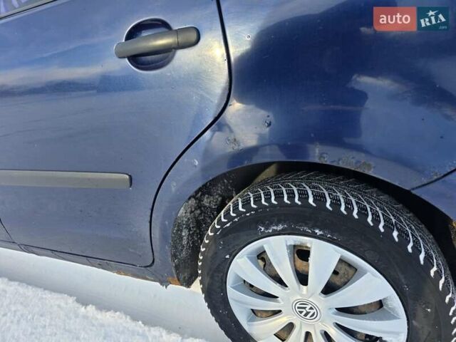 Синій Фольксваген Поло, об'ємом двигуна 1.4 л та пробігом 219 тис. км за 4550 $, фото 17 на Automoto.ua