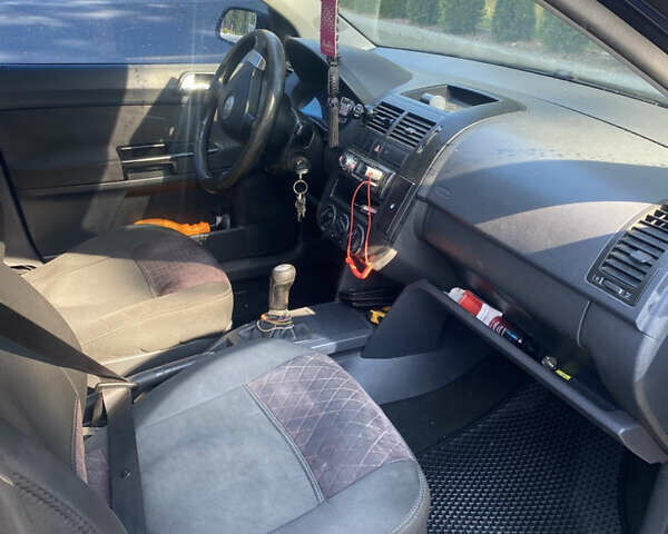 Синий Фольксваген Поло, объемом двигателя 1.2 л и пробегом 244 тыс. км за 3400 $, фото 4 на Automoto.ua