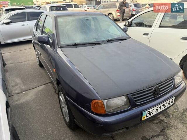 Синий Фольксваген Поло, объемом двигателя 1.4 л и пробегом 230 тыс. км за 1850 $, фото 1 на Automoto.ua