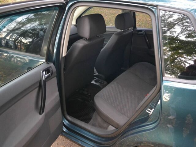 Зелений Фольксваген Поло, об'ємом двигуна 1.4 л та пробігом 230 тис. км за 4995 $, фото 7 на Automoto.ua