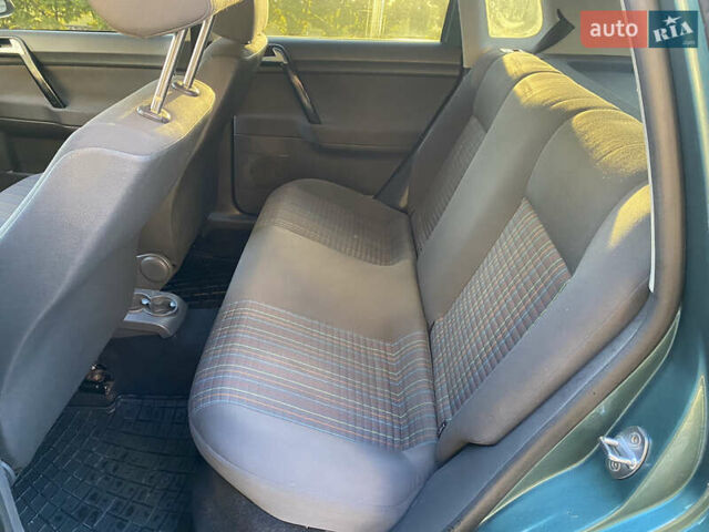 Зеленый Фольксваген Поло, объемом двигателя 1.4 л и пробегом 295 тыс. км за 2850 $, фото 7 на Automoto.ua