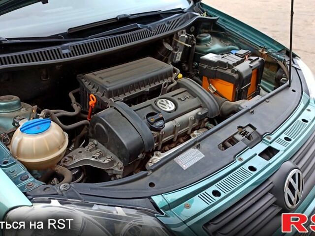 Зеленый Фольксваген Поло, объемом двигателя 1.4 л и пробегом 125 тыс. км за 6000 $, фото 12 на Automoto.ua