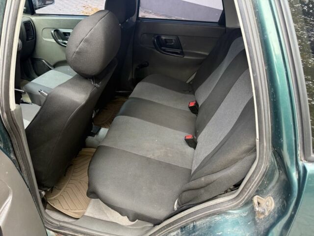 Зеленый Фольксваген Поло, объемом двигателя 1.4 л и пробегом 555 тыс. км за 1375 $, фото 11 на Automoto.ua