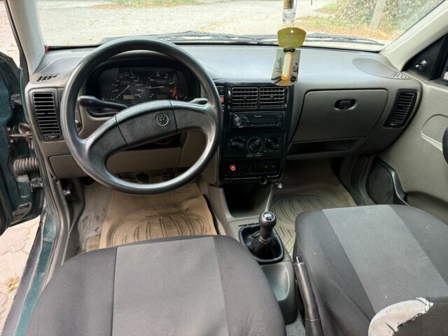 Зеленый Фольксваген Поло, объемом двигателя 1.4 л и пробегом 555 тыс. км за 1375 $, фото 12 на Automoto.ua