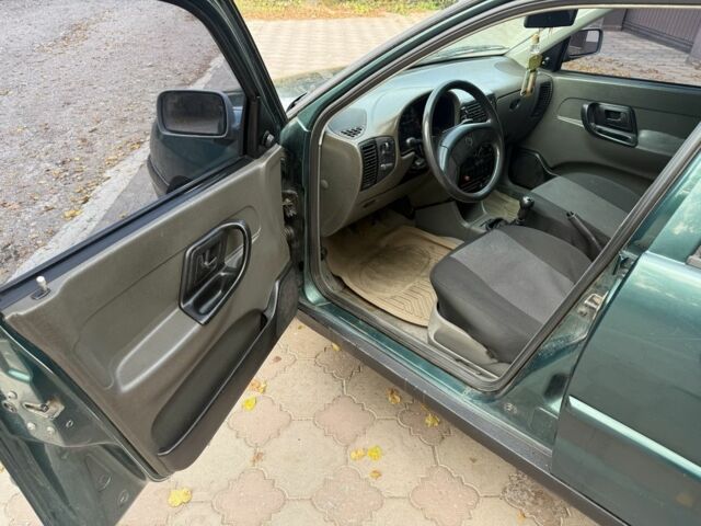 Зеленый Фольксваген Поло, объемом двигателя 1.4 л и пробегом 555 тыс. км за 1375 $, фото 9 на Automoto.ua