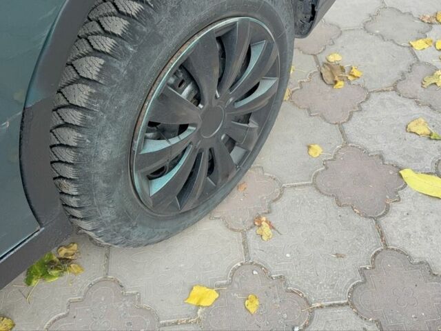 Зеленый Фольксваген Поло, объемом двигателя 1.4 л и пробегом 555 тыс. км за 1375 $, фото 13 на Automoto.ua