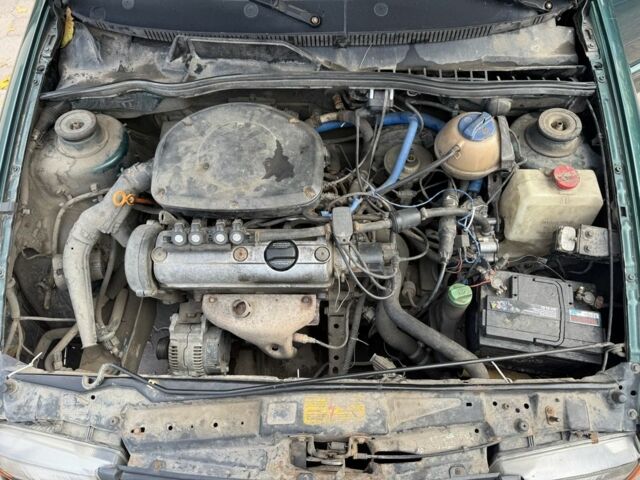 Зеленый Фольксваген Поло, объемом двигателя 1.4 л и пробегом 555 тыс. км за 1375 $, фото 8 на Automoto.ua