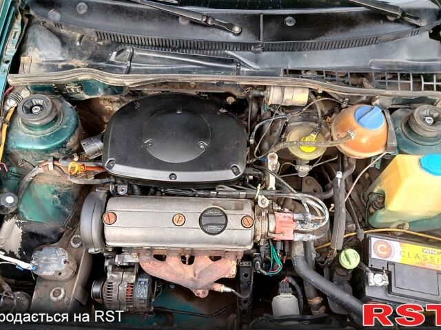 Фольксваген Поло 1998 у Снигиревке на Automoto.ua Зелений Фольксваген Поло, об'ємом двигуна 1.4 л та пробігом 170 тис. км за 1750 $, фото 9 на Automoto.ua