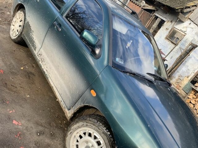 Зеленый Фольксваген Поло, объемом двигателя 1.4 л и пробегом 247 тыс. км за 1900 $, фото 1 на Automoto.ua