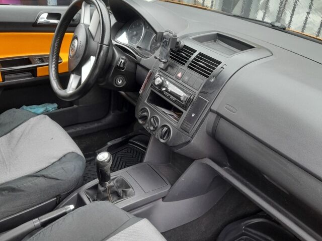 Помаранчевий Фольксваген Поло, об'ємом двигуна 1.4 л та пробігом 160 тис. км за 5200 $, фото 9 на Automoto.ua