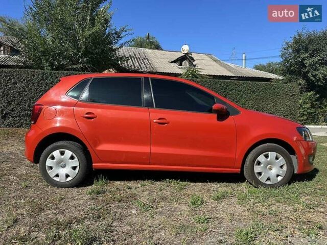 Оранжевый Фольксваген Поло, объемом двигателя 1.39 л и пробегом 105 тыс. км за 9000 $, фото 1 на Automoto.ua