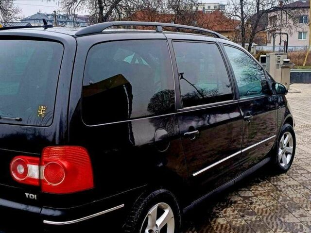 Черный Фольксваген Шаран, объемом двигателя 1 л и пробегом 260 тыс. км за 6500 $, фото 1 на Automoto.ua