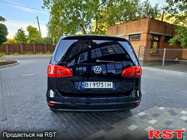 Фольксваген Шаран 2013 в Полтаве на Automoto.ua Черный Фольксваген Шаран, объемом двигателя 2 л и пробегом 246 тыс. км за 12200 $, фото 1 на Automoto.ua