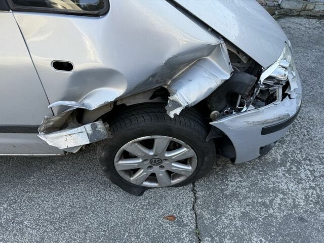 Серый Фольксваген Шаран, объемом двигателя 1.8 л и пробегом 380 тыс. км за 2700 $, фото 1 на Automoto.ua