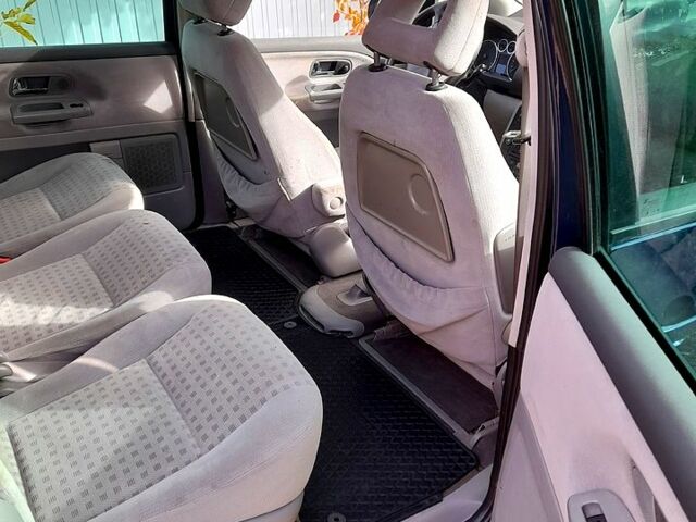 Синий Фольксваген Шаран, объемом двигателя 1.8 л и пробегом 311 тыс. км за 4500 $, фото 4 на Automoto.ua