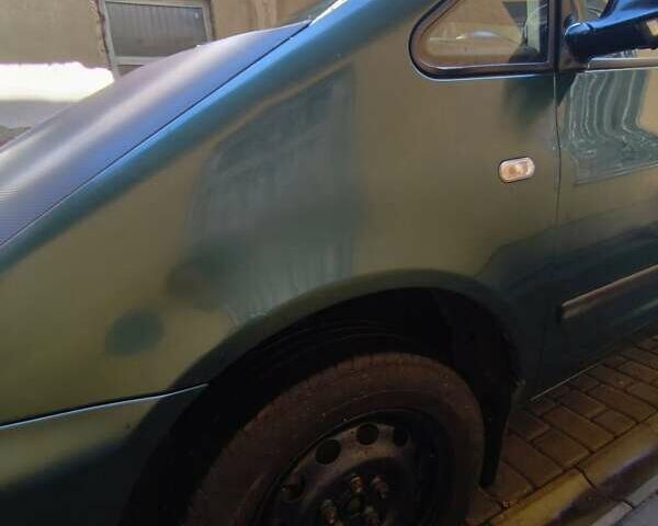 Зеленый Фольксваген Шаран, объемом двигателя 1.9 л и пробегом 395 тыс. км за 3700 $, фото 2 на Automoto.ua