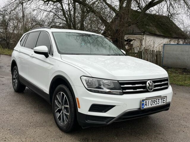 Белый Фольксваген Тигуан, объемом двигателя 2 л и пробегом 119 тыс. км за 20000 $, фото 2 на Automoto.ua
