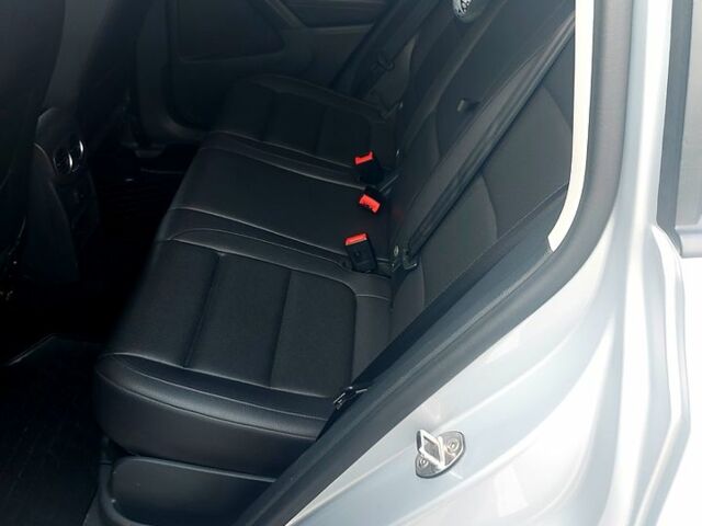 Білий Фольксваген Тігуан, об'ємом двигуна 1.9 л та пробігом 100 тис. км за 15100 $, фото 3 на Automoto.ua