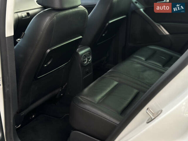 Белый Фольксваген Тигуан, объемом двигателя 1.4 л и пробегом 225 тыс. км за 9700 $, фото 27 на Automoto.ua