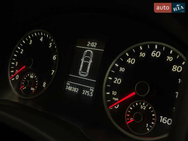 Белый Фольксваген Тигуан, объемом двигателя 1.98 л и пробегом 348 тыс. км за 8999 $, фото 26 на Automoto.ua