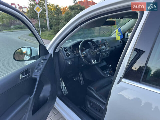 Білий Фольксваген Тігуан, об'ємом двигуна 2 л та пробігом 245 тис. км за 13500 $, фото 14 на Automoto.ua