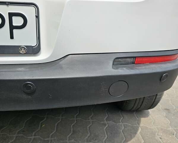 Білий Фольксваген Тігуан, об'ємом двигуна 1.98 л та пробігом 162 тис. км за 11800 $, фото 26 на Automoto.ua