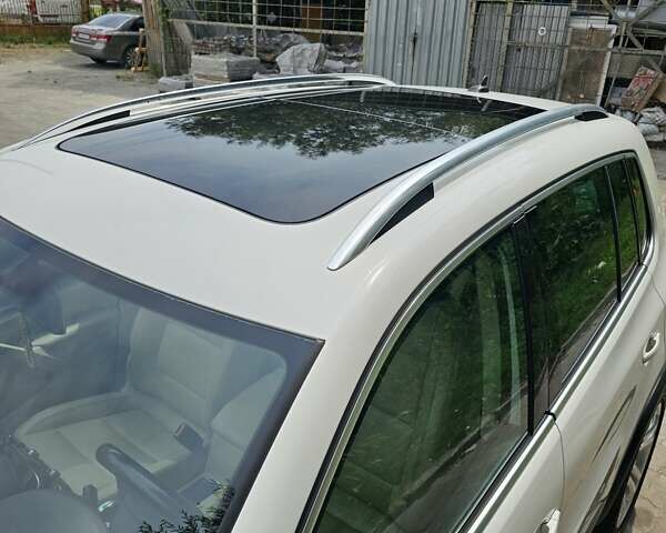 Білий Фольксваген Тігуан, об'ємом двигуна 1.98 л та пробігом 162 тис. км за 11800 $, фото 10 на Automoto.ua