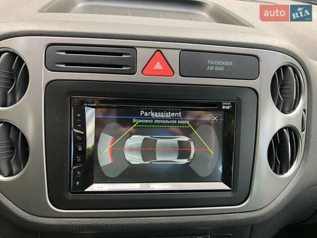 Білий Фольксваген Тігуан, об'ємом двигуна 2 л та пробігом 165 тис. км за 13600 $, фото 88 на Automoto.ua