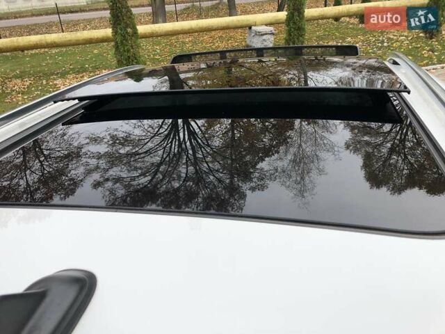 Білий Фольксваген Тігуан, об'ємом двигуна 2 л та пробігом 165 тис. км за 13600 $, фото 112 на Automoto.ua