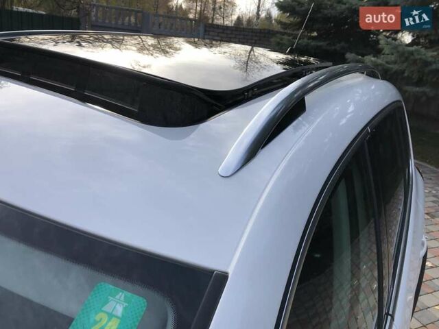 Білий Фольксваген Тігуан, об'ємом двигуна 2 л та пробігом 165 тис. км за 13600 $, фото 29 на Automoto.ua