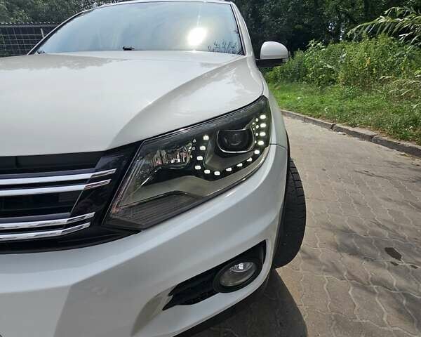 Білий Фольксваген Тігуан, об'ємом двигуна 1.98 л та пробігом 162 тис. км за 11800 $, фото 2 на Automoto.ua