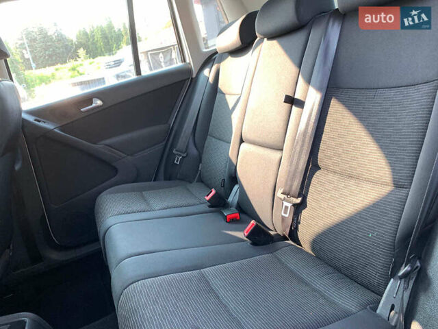 Білий Фольксваген Тігуан, об'ємом двигуна 2 л та пробігом 208 тис. км за 13890 $, фото 26 на Automoto.ua