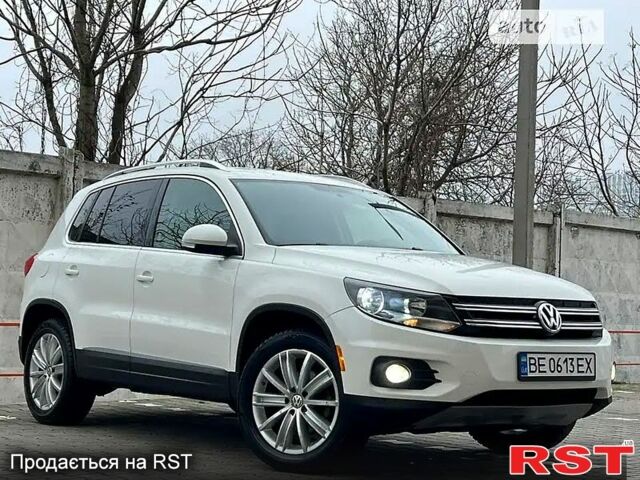 Белый Фольксваген Тигуан, объемом двигателя 2 л и пробегом 153 тыс. км за 12500 $, фото 1 на Automoto.ua