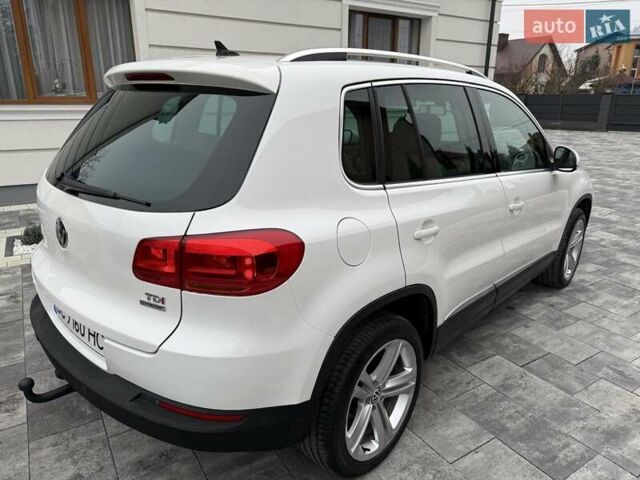Белый Фольксваген Тигуан, объемом двигателя 2 л и пробегом 142 тыс. км за 12999 $, фото 1 на Automoto.ua
