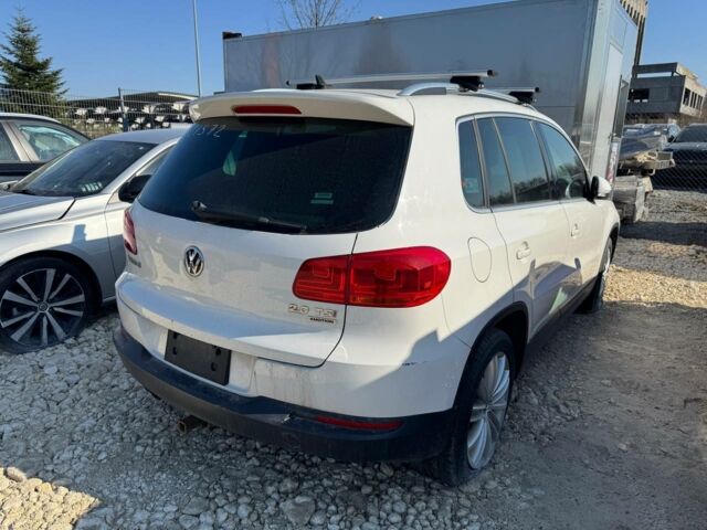 Білий Фольксваген Тігуан, об'ємом двигуна 2 л та пробігом 202 тис. км за 9200 $, фото 2 на Automoto.ua